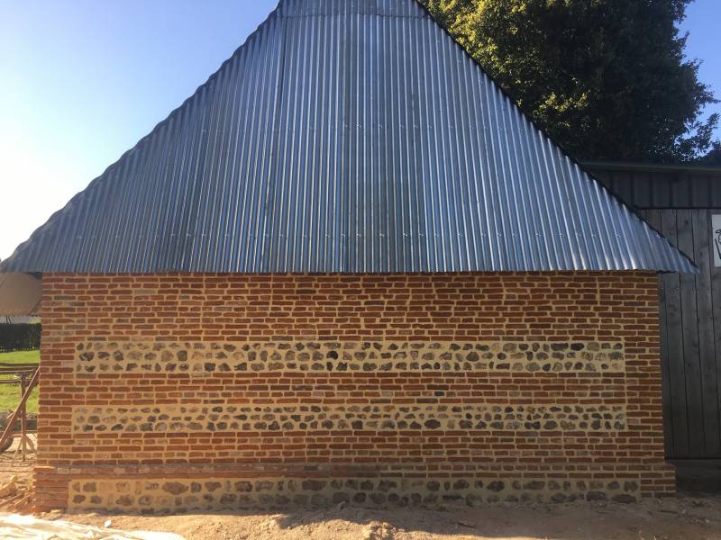 Réfection d'un mur en brique est silex secteur Valmont